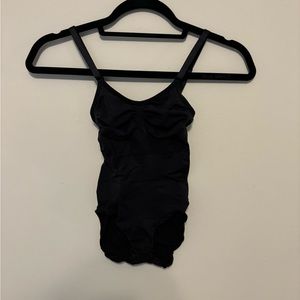 Skims shape wear body suit.